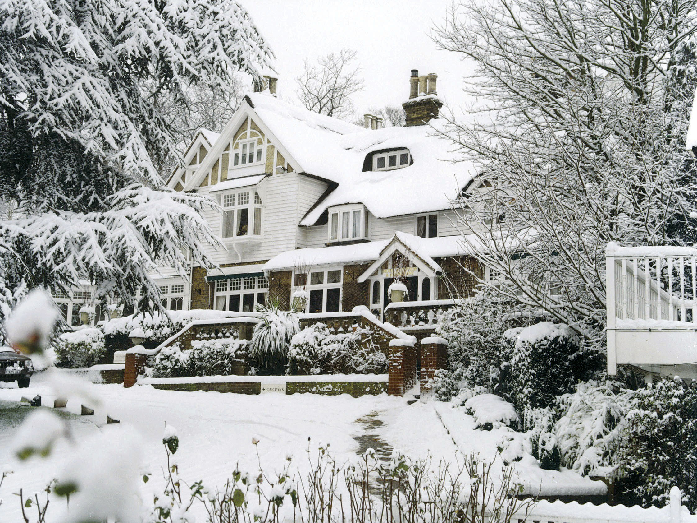 Exterior of Rowhill Grange in the Snow.