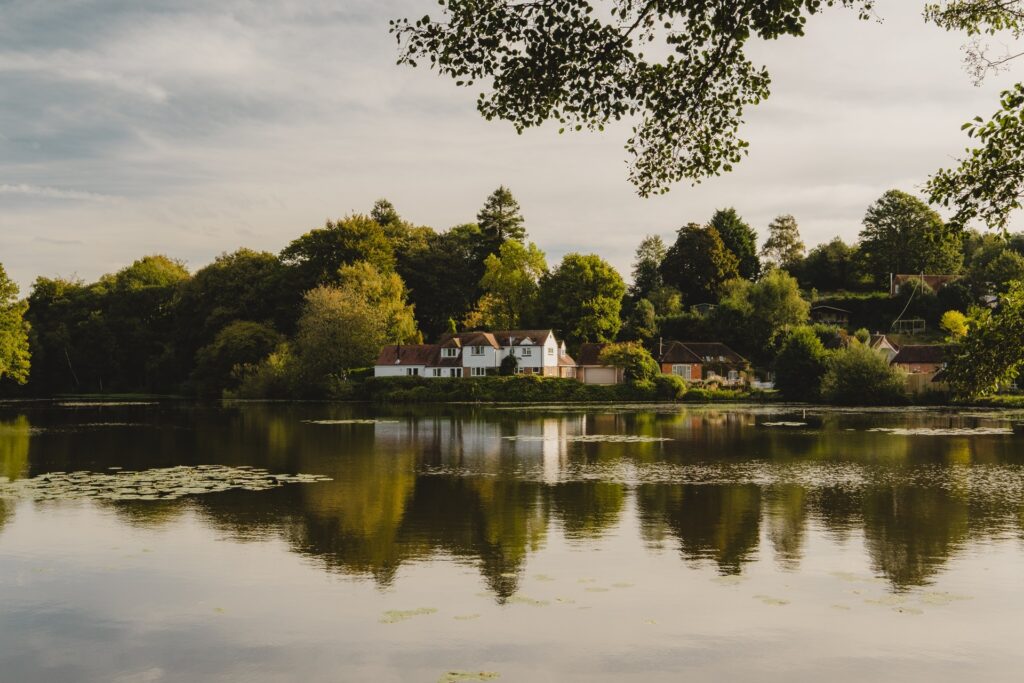 Lake at Crafted at Powdermills with hotel buildings in the background, East Sussex