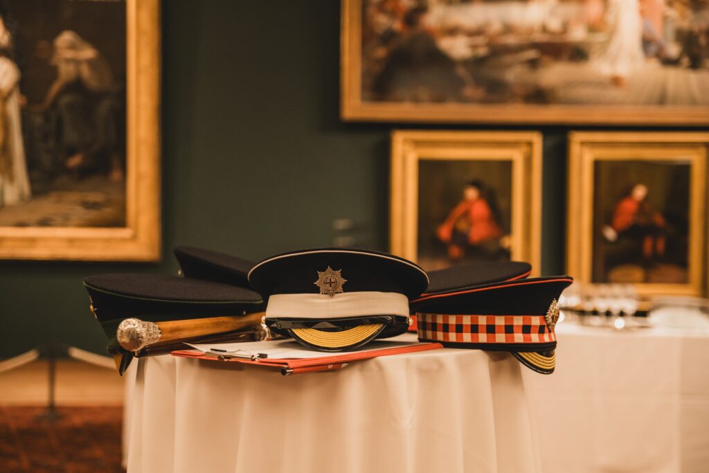 army hats on a table for the Lord Mayor's Big Curry Lunch