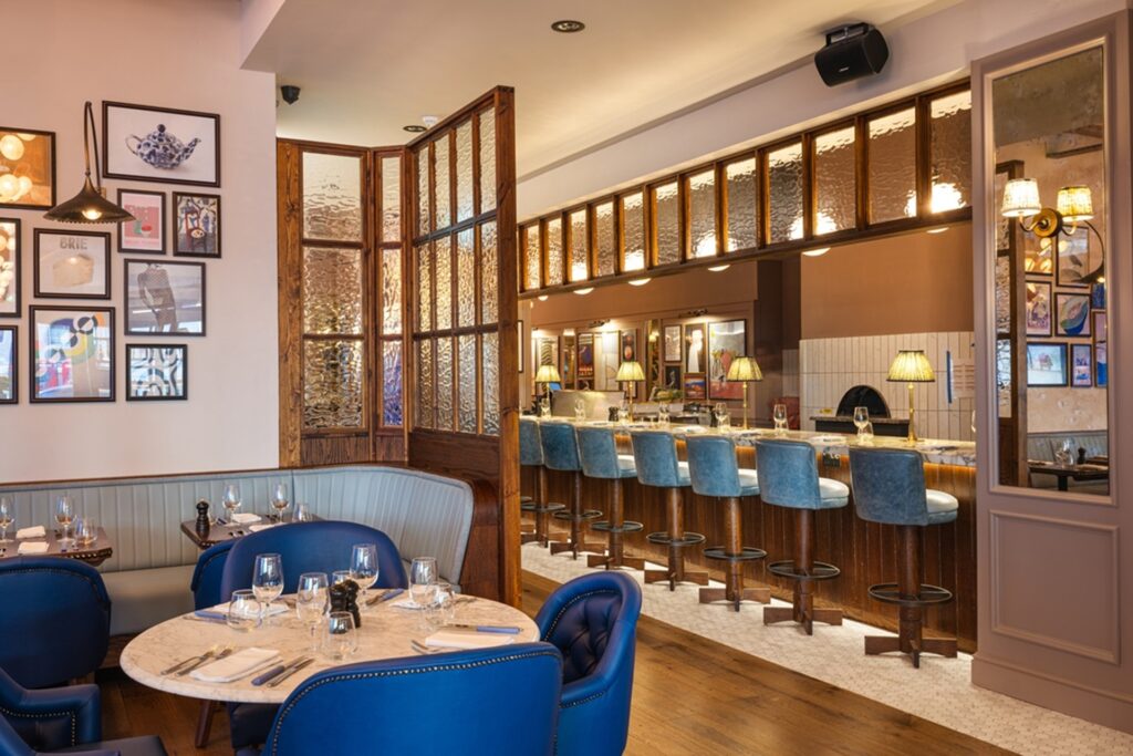 Interior of Richoux restaurant at Langham Place, showing dining tables and banquette seating